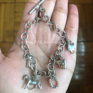 Sterling silver horse charm bracelet with 5 charms